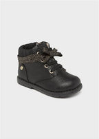 STIVALETTO CON BORCHIE