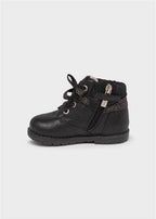 STIVALETTO CON BORCHIE